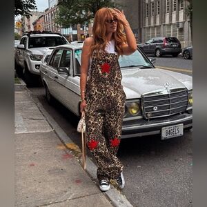 Dressed in LALA Rising Star Leopard Overalls with Red Stars